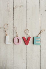 Love vintage letters on wooden background