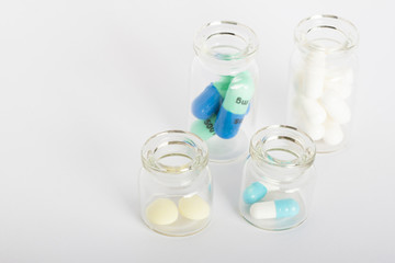 bottles with colorful pills