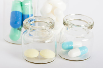 bottles with colorful pills