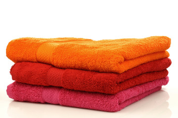 three colorful towels on a white background