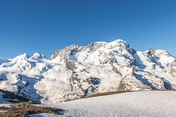 Fototapeta premium mountain with blue sky, Alps, Zermatt, Switzerland
