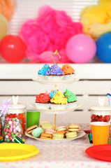 Prepared birthday table with sweets for children party