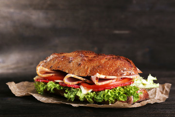 Fresh and tasty sandwich with ham and vegetables