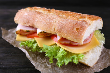 Fresh and tasty sandwich with ham and vegetables