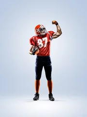 Foto op Plexiglas American football player in action white isolated © 103tnn
