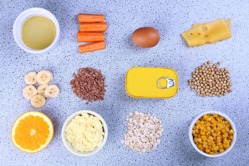 Obraz na płótnie Canvas Various food products containing vitamins on table