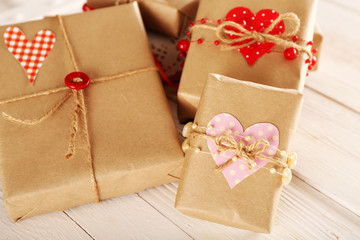 Beautiful gift boxes on wooden background. Valentine Day
