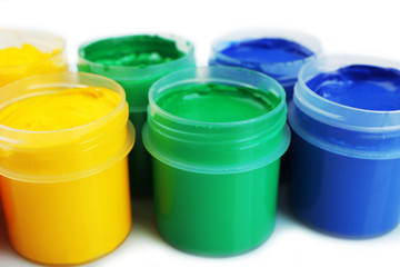 Colorful paint on white background, closeup view