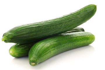  fresh cucumbers on a white background