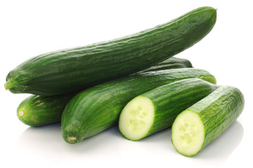  fresh cucumbers on a white background