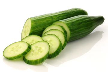  fresh cucumbers on a white background