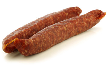 traditional frisian dried sausages on a white background