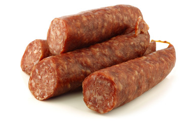 traditional frisian dried sausages on a white background