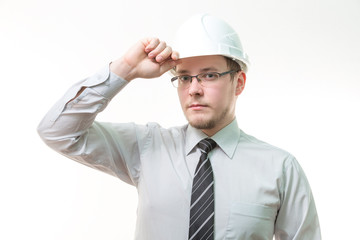man in business suit and white helmet on  white background