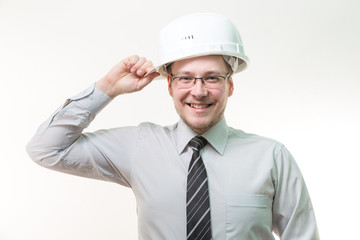 cheerful engineer turned on its side a white helmet