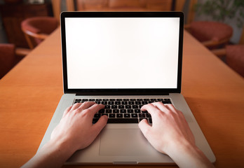 Man hands using, on laptop with blank screen, first person view.