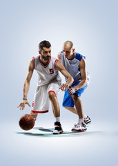 Two basketball players in action