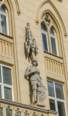 Obraz premium Statue of a knight on a house in Lviv