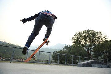  skateboarder skateboarding at skatepark