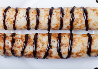 Russian pancakes - blini with chocolate topping