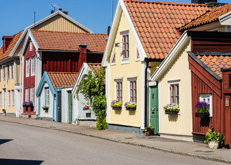 Street and buildings in the town Kalmar in Sweden. - obrazy, fototapety, plakaty