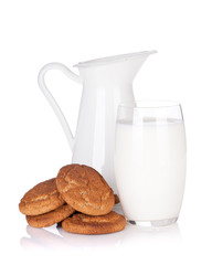 Milk jug, glass and cookies