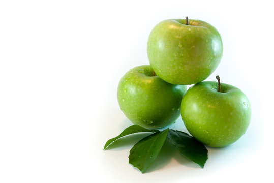 Three green apple isolated