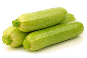 light green zucchini (Cucurbita pepo) on a white background