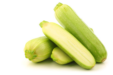 light green zucchini (Cucurbita pepo) on a white background