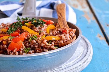 Rice red with paprika and thyme