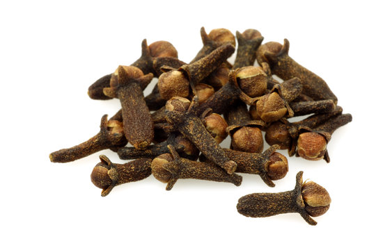 dried spicy cloves on a white background