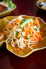 Thai cuisine - hot and spicy papaya salad