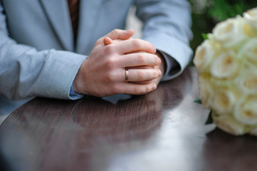 hands of the bride with wedding rings