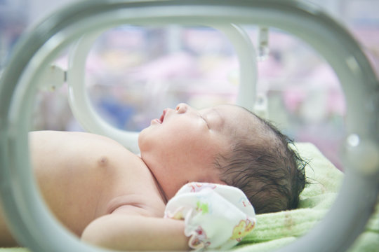 Newborn Baby In Incubator Care At Nursery