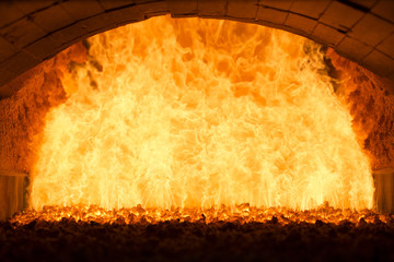Coal fire inside steam boiler