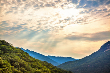 Mountains landscape and cloudy sky with sunbeams in Korea