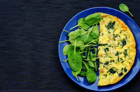 Frittata with chicken and spinach and fresh spinach