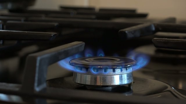 4k zooming in on a kitchen hob, cooker