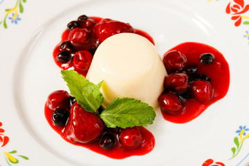 Panna cotta with berry sauce