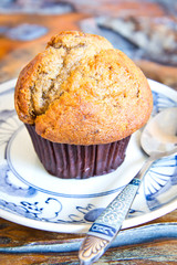 a muffin on wooden table