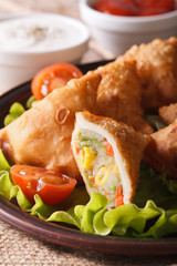 samosa stuffed with vegetables macro. Vertical