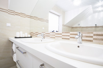 Double sink in the bright bathroom