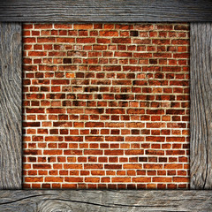 wood frame with brick wall