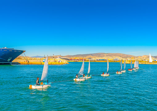 Optimist Sailing Boats During Training At Saronic Gulf In Greece