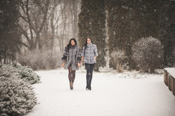 funny girls enjoying winter weather