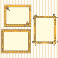 Golden frames with vintage ornaments