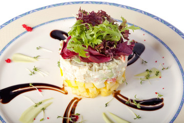 crab salad with vegetables on a plate