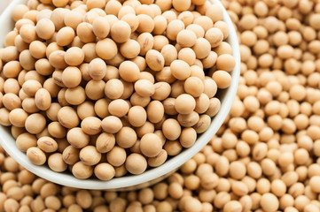 Soy beans in a bowl on wooden desk