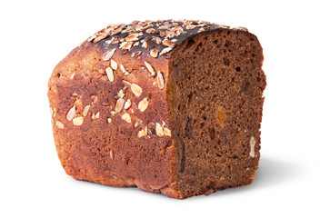 Half unleavened of black bread with seeds and dried fruit