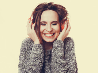 Woman with headphones listening music